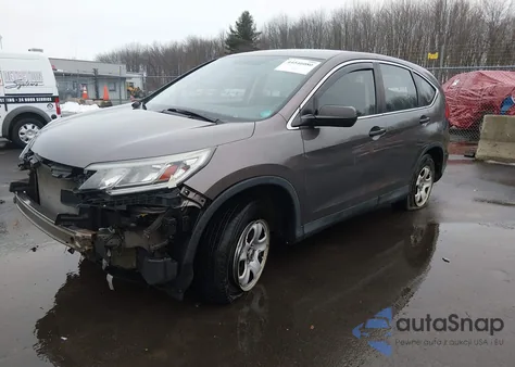2015 Honda Cr-V Lx z USA, uszkodzony, nr VIN 2HKRM4H39FH632864
